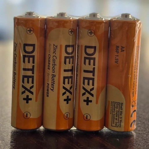 باطری قلمی کربنی DETEX مدل AA R6P 1.5V – بسته 4 عددی
